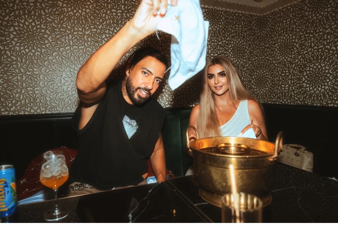 Fashion Bomb Couples French Montana Steps Out With The Princess Of Dubai In A Red Embellished Bomber Jacket 2