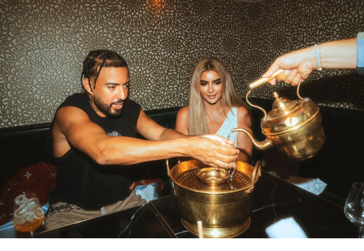 Fashion Bomb Couples French Montana Steps Out With The Princess Of Dubai In A Red Embellished Bomber Jacket 4