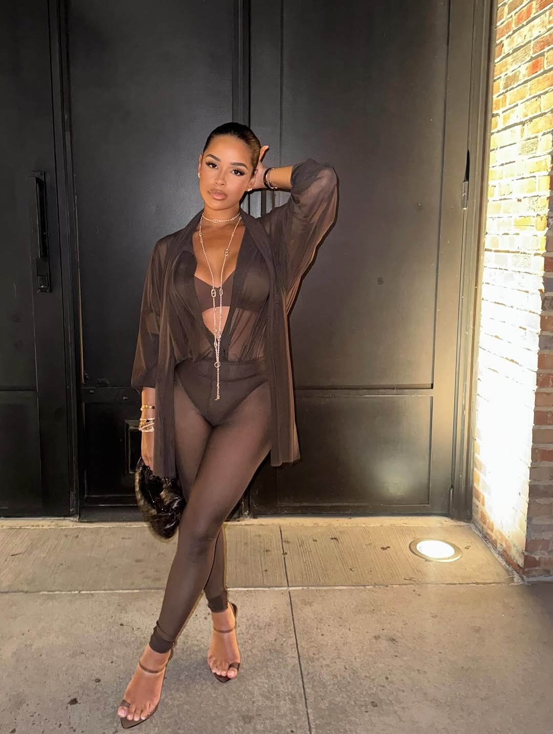 Lataina Turns Up The Heat In Brown Sheer Norma Kamali Bodysuit And Leggings