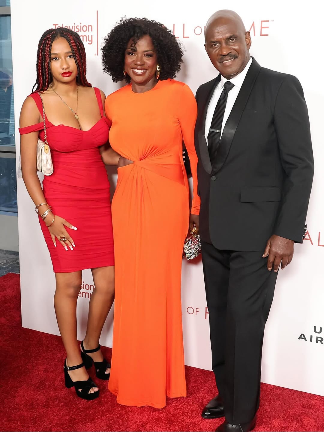 2 Viola Davis Shines In Orange Ralph Lauren Cut Out Gown With Husband Julius Tennon And Daughter Genesis At Television Academys Hall Of Fame Induction