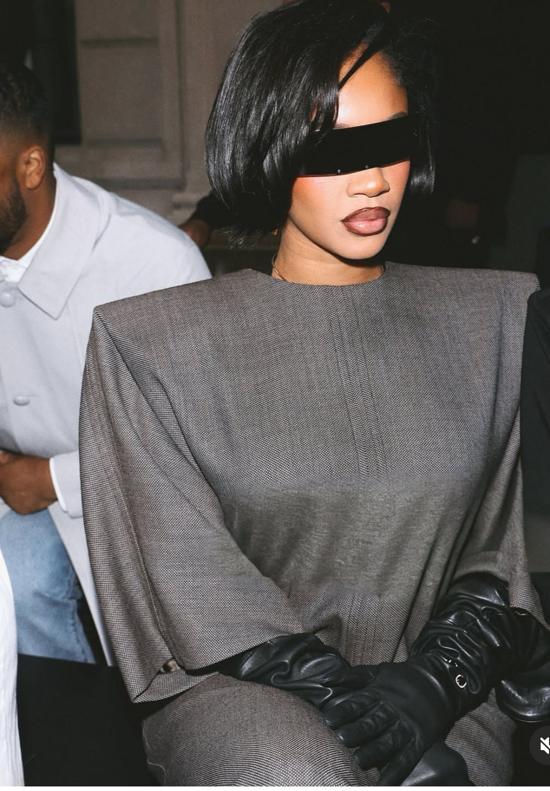 Milan Fashion Week Sweetie Attended The MM6 Maison Margiela Runway Show In A Gray Structured Dress With Black Gloves And Tan Boots 1