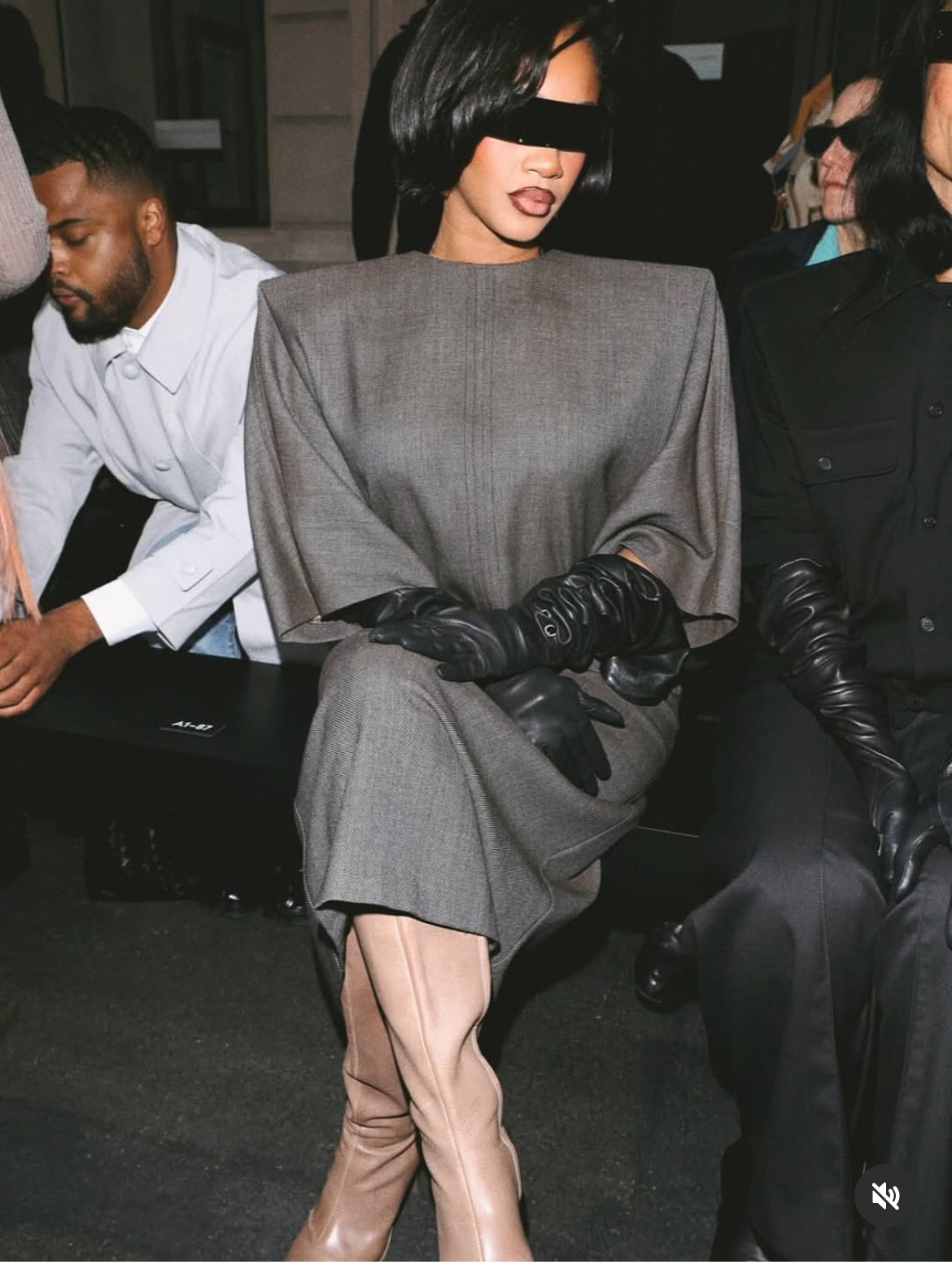 Milan Fashion Week Sweetie Attended The MM6 Maison Margiela Runway Show In A Gray Structured Dress With Black Gloves And Tan Boots 3