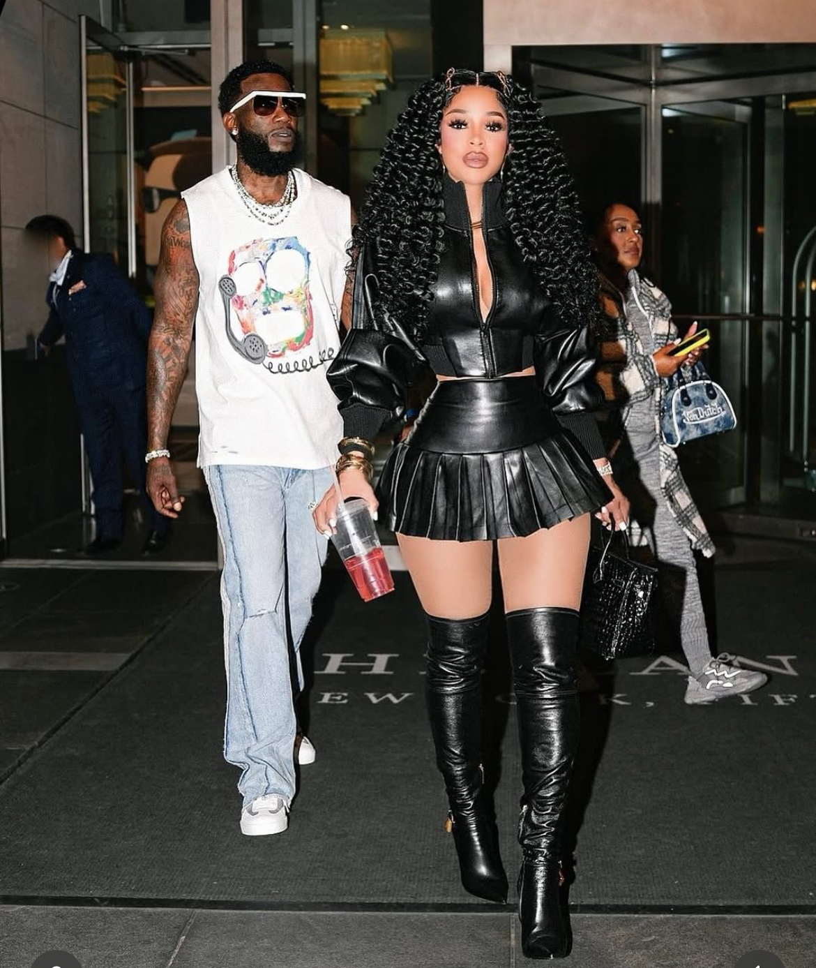 Keyshia KaOir Stepped Out With Gucci Mane In A Black Norma Kamali Leather Jacket And Pleated Mini Skirt 3