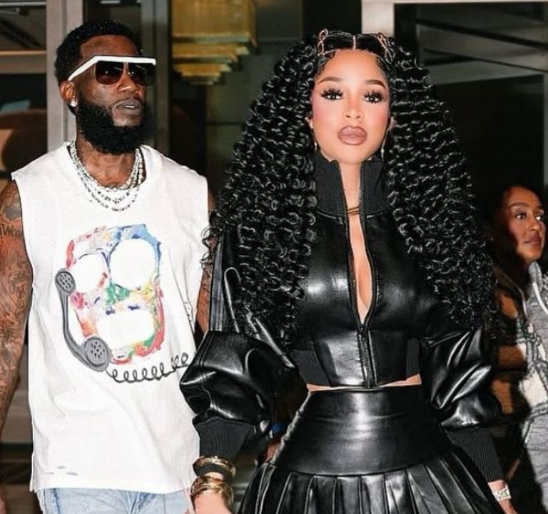 Keyshia Ka’Oir Stepped Out with Gucci Mane in a Black Norma Kamali  Leather Jacket and Pleated Mini Skirt