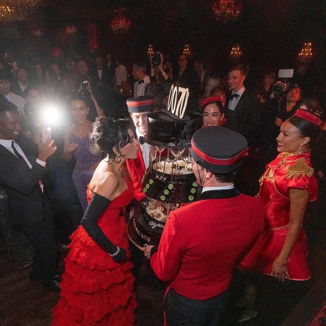 Kris Jenner Celebrated Her 70th Star Studded Birthday In A Red Strapless Givenchy Dress 18
