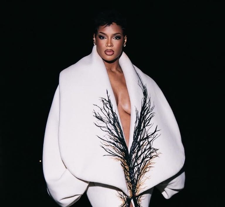 Didi Stone Wears Ivory Sculptural Stephane Rolland Haute Couture Gown to Time France Event