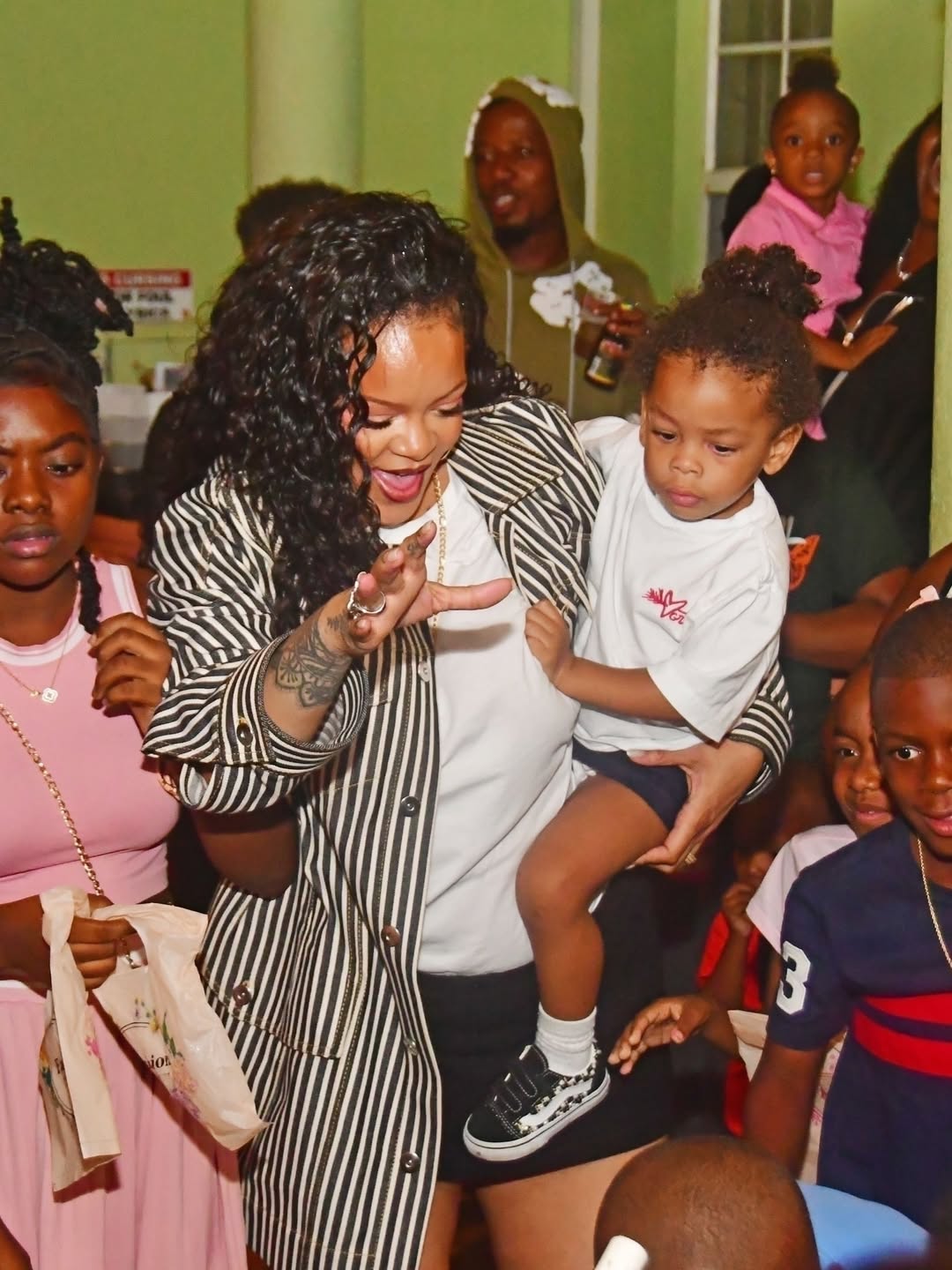 3 Rihanna Poses With Her Aunt Grandmother And Sons In Barbados Wearing A 3900 Bottega Veneta Jacket And 1350 Miu Miu Sneakers