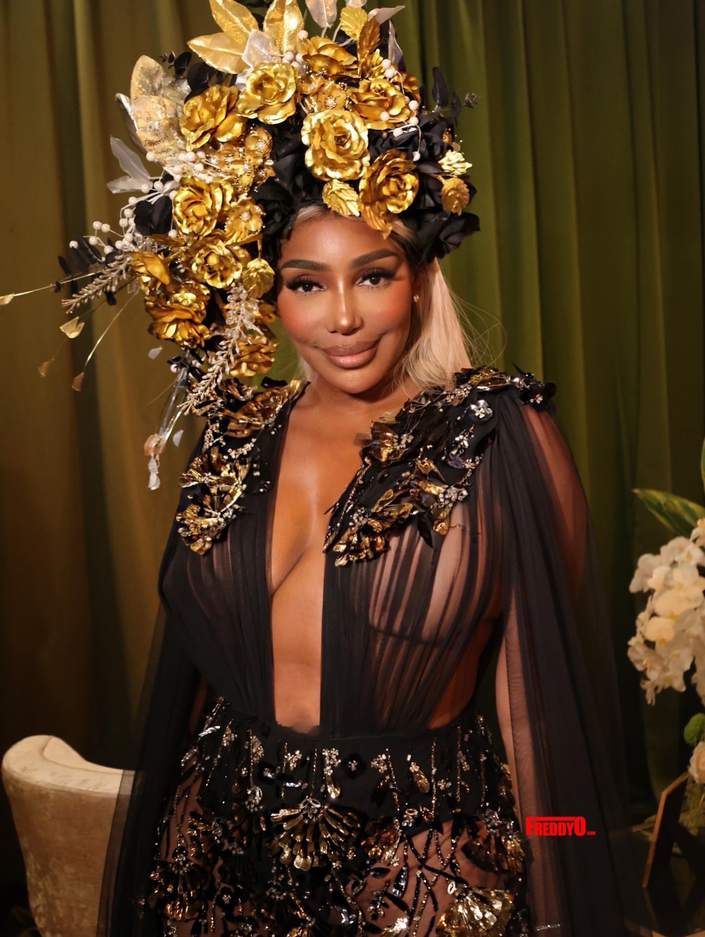 Nene Leakes Appeared On Bravo TVs Ultimate Road Trip In A Michael Costello Gown And A Laurel Dewitt Floral Headpiece 2