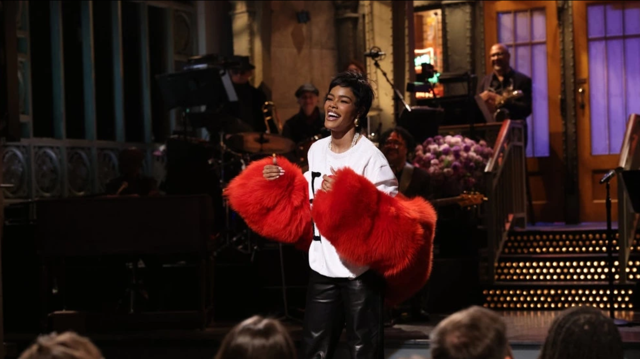 Teyana Taylor Hosts SNL In A Chanel Pre Fall 2026 Red Fur Jacket And I  NY Sequined Shirt