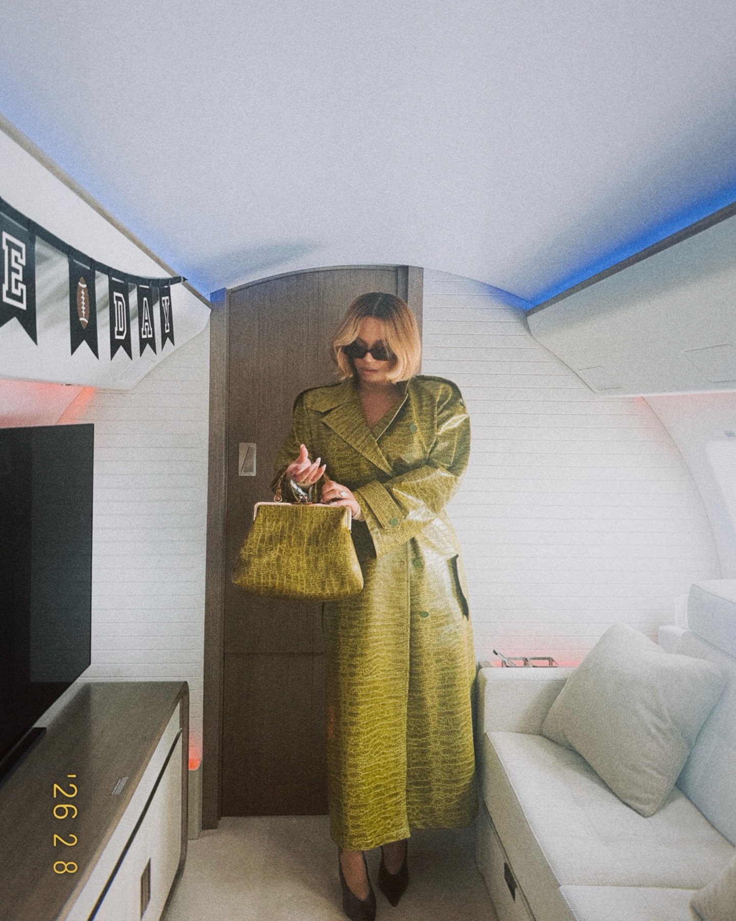 8 Beyonce Debuted A New Bob Hairstyle In A Green Croc Embossed Rowen Rose Trench At The 2026 Super Bowl