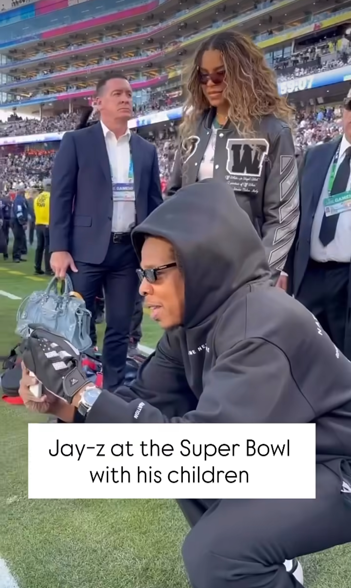 Blue Ivy Attended The Super Bowl Alongside Father Jay Z In A Off White Letterman Jacket And Balenciaga Handbag 1