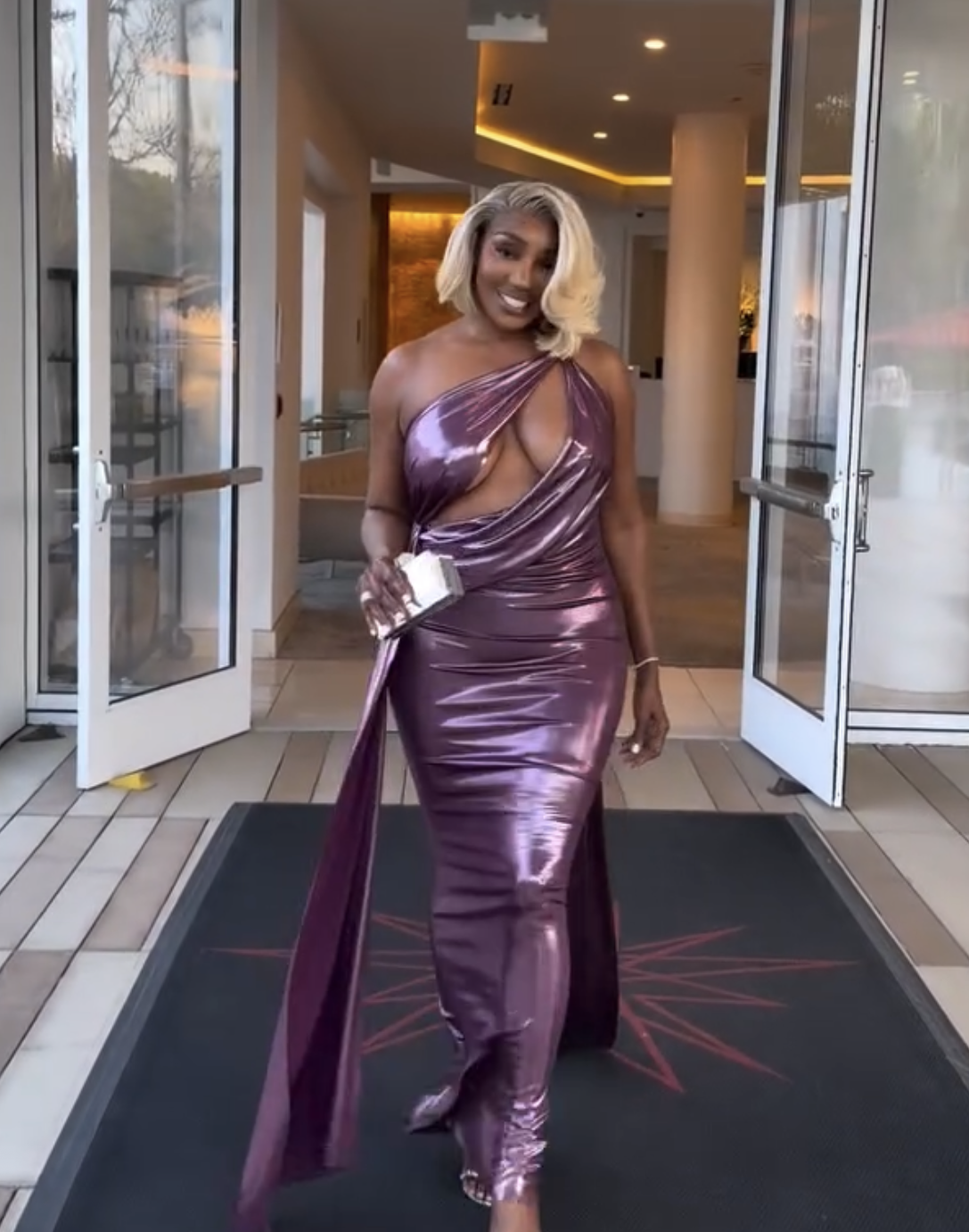 909 Nene Leakes Hits Oscars 2026 Parties In Purple Metallic Michael Costello Gown