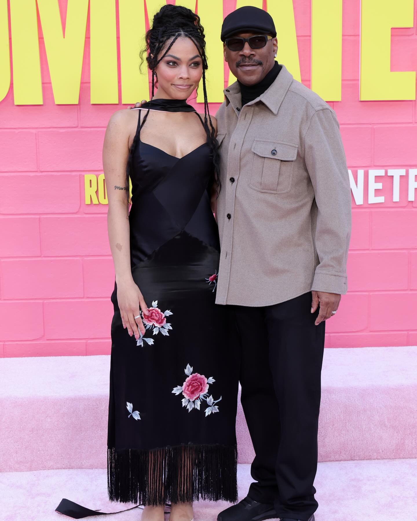 2 On The Scene At The Netflix Roommates Premiere Eddie Murphy Chris Rock Adam Sandler And Their Daughters In Black Silk Cut Out Gowns And Red Satin