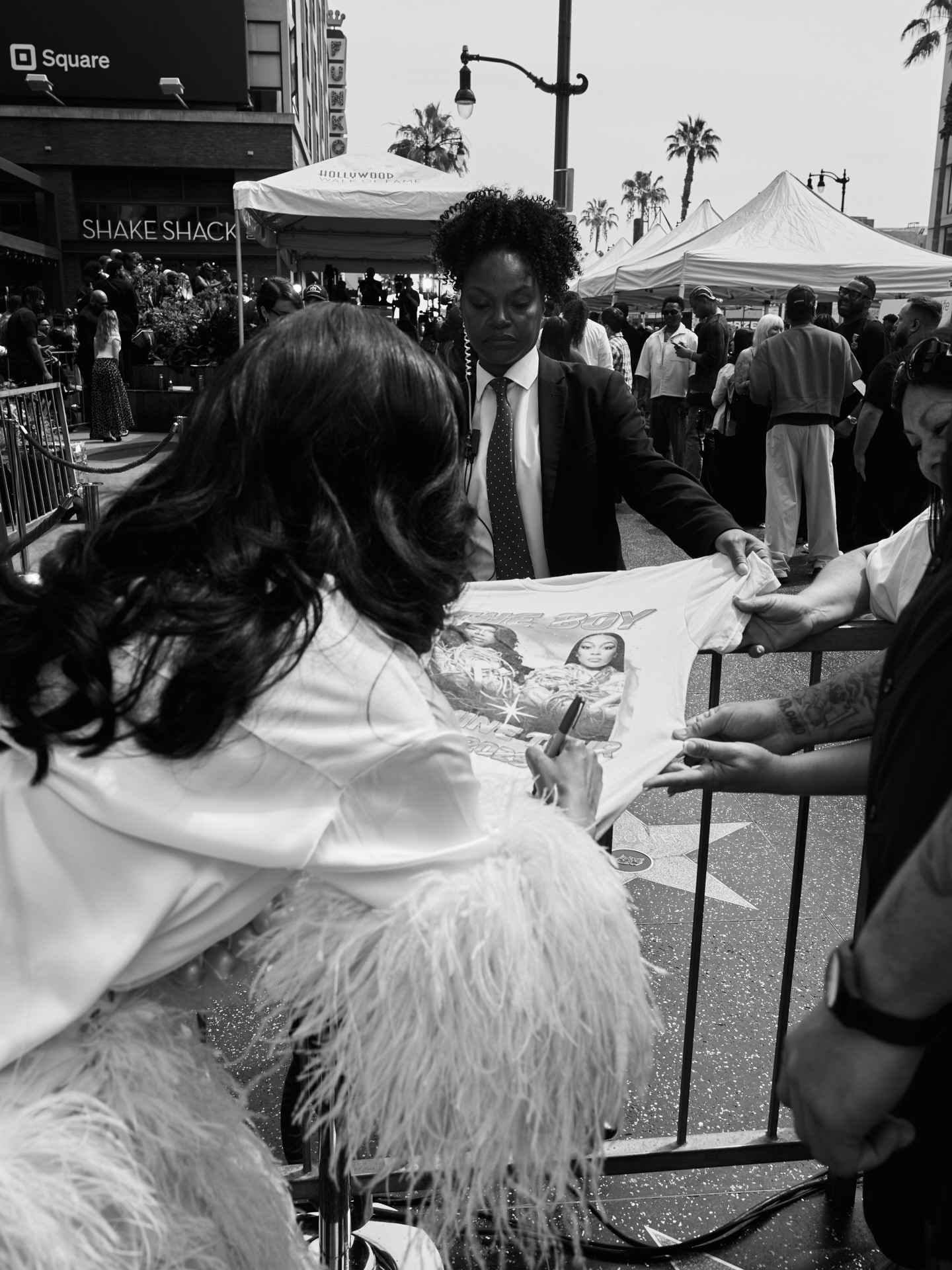 Monica Steps Out With Husband Anthony Ant Wilson At Brandys Hollywood Walk Of Fame Ceremony In Ivory Feathered LaPointe Silk Blouse And Coordinating Trousers Image 1775087584 7