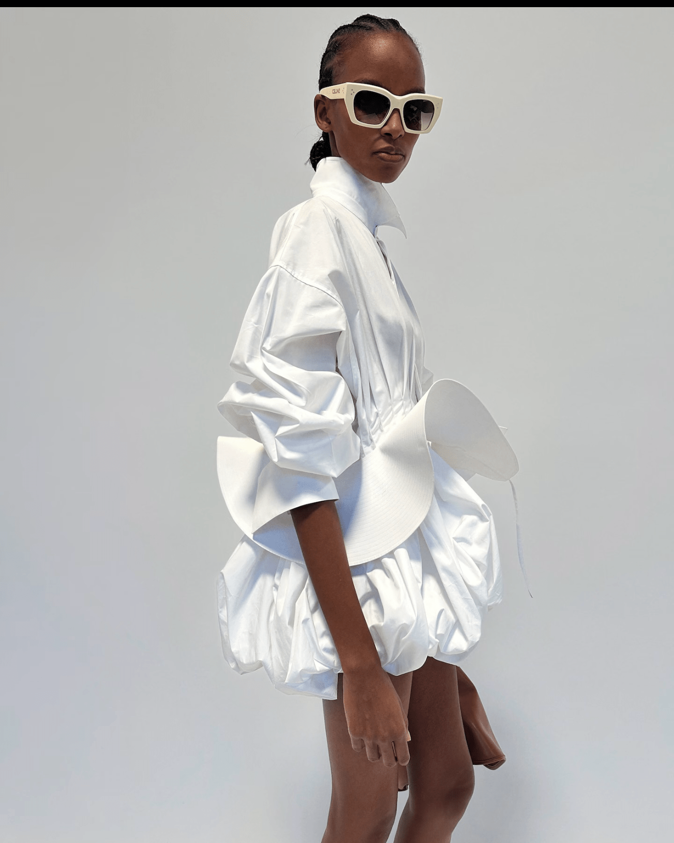 9090 Nia Long Wore A Celine White Sculptural Shirt Dress And The Attico Ornella Dark Green Platform Stiletto Sandals At The Estee Lauder Pop Up Bus In New York City
