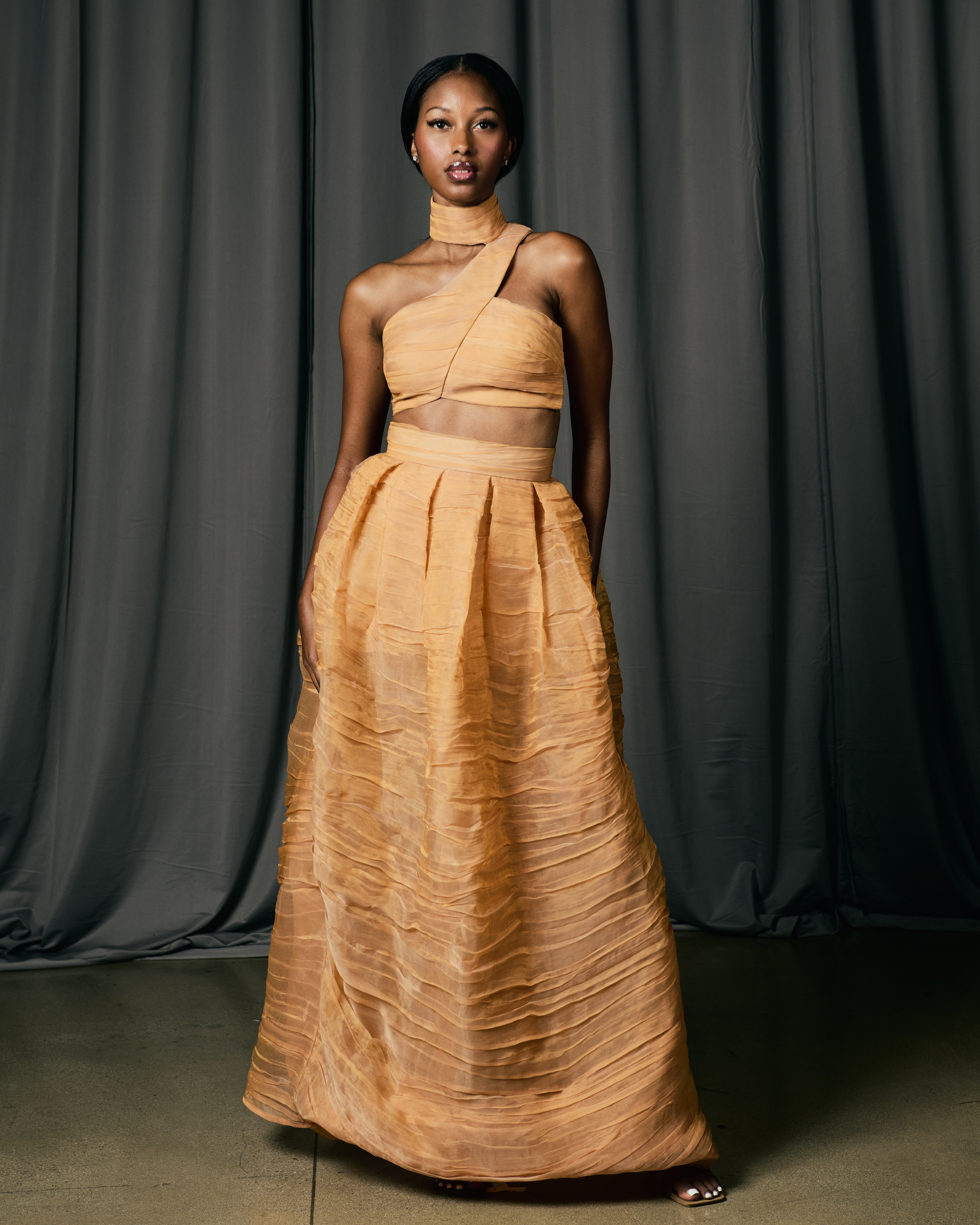 Model wearing VIVIANCHAN X The Bomb Fashion Show LA X Cadillac